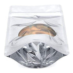 Stand Up Zipper Bag with Clear Oval Window - Metalized (1 Ounce)